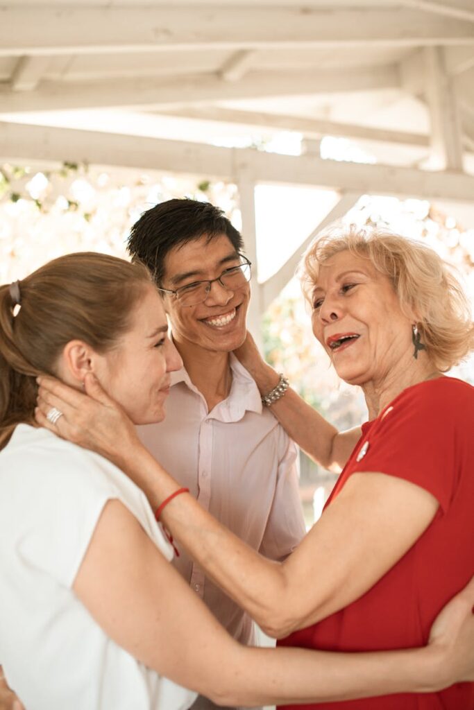 elderly woman talking to the couple